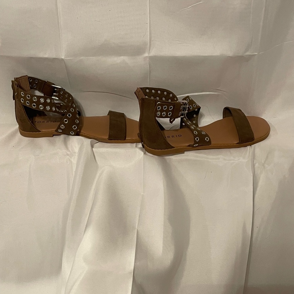 Brown gladiator style sandals